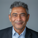 Professional headshot of satisfied client testimonial